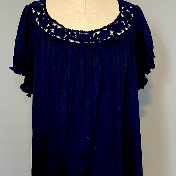 Tops - Woman’s gently worn navy embroidered top